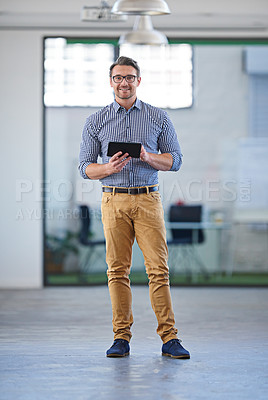 Buy stock photo Full length portrait of a mature professional holding a digital tablet in an open  an open office space