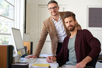 Buy stock photo Portrait of two male designers looking seriously at the camera