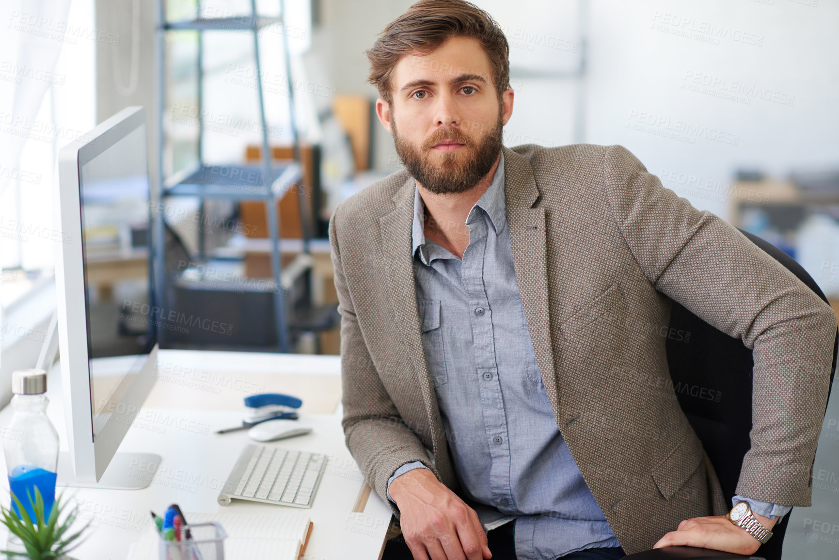 Buy stock photo Portrait, startup and man at desk in office, pride and creative agency with graphic designer and career ambition. Face, publisher and journalist in workplace, employee and pc with magazine editor