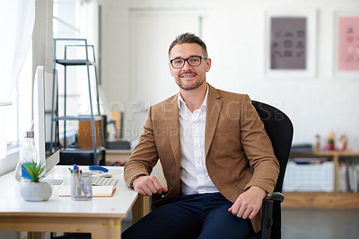 Buy stock photo Businessman, glasses and portrait in office, writer and smile for project, reporter and professional. Face, proud and entrepreneur in company, journalist and confidence in startup and computer