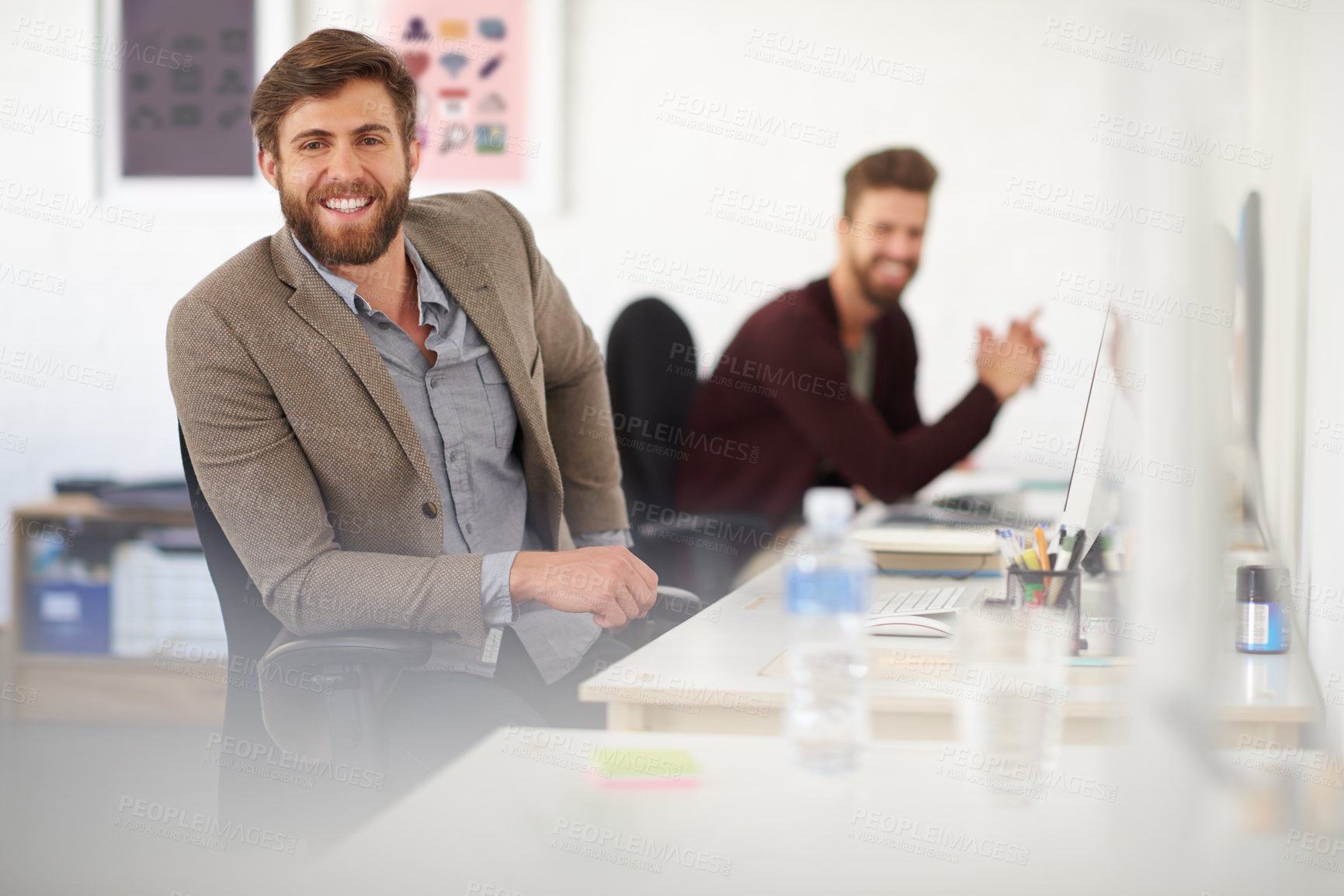 Buy stock photo Businessman, startup and portrait in office, joy and coworking of colleagues, computer and together. Face, working and entrepreneur in company, journalist and creative with confidence and table