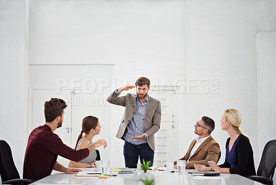 Buy stock photo Shot of a group of businesspeople in the boardroom