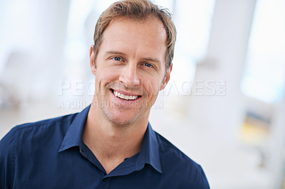 Buy stock photo Cropped portrait of a handsome man at home