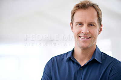 Buy stock photo Happy, consultant and realtor of property in portrait at office with development or opportunity in mockup. Man, agent and excited for investment in real estate with sales and advice on mortgage loan