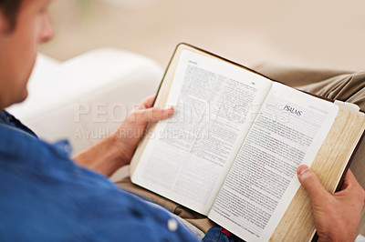 Buy stock photo Person, hands and reading bible or Christianity religion for study information, book or belief. Worship, prayer and scripture learning in home apartment or God education as praise, search or help