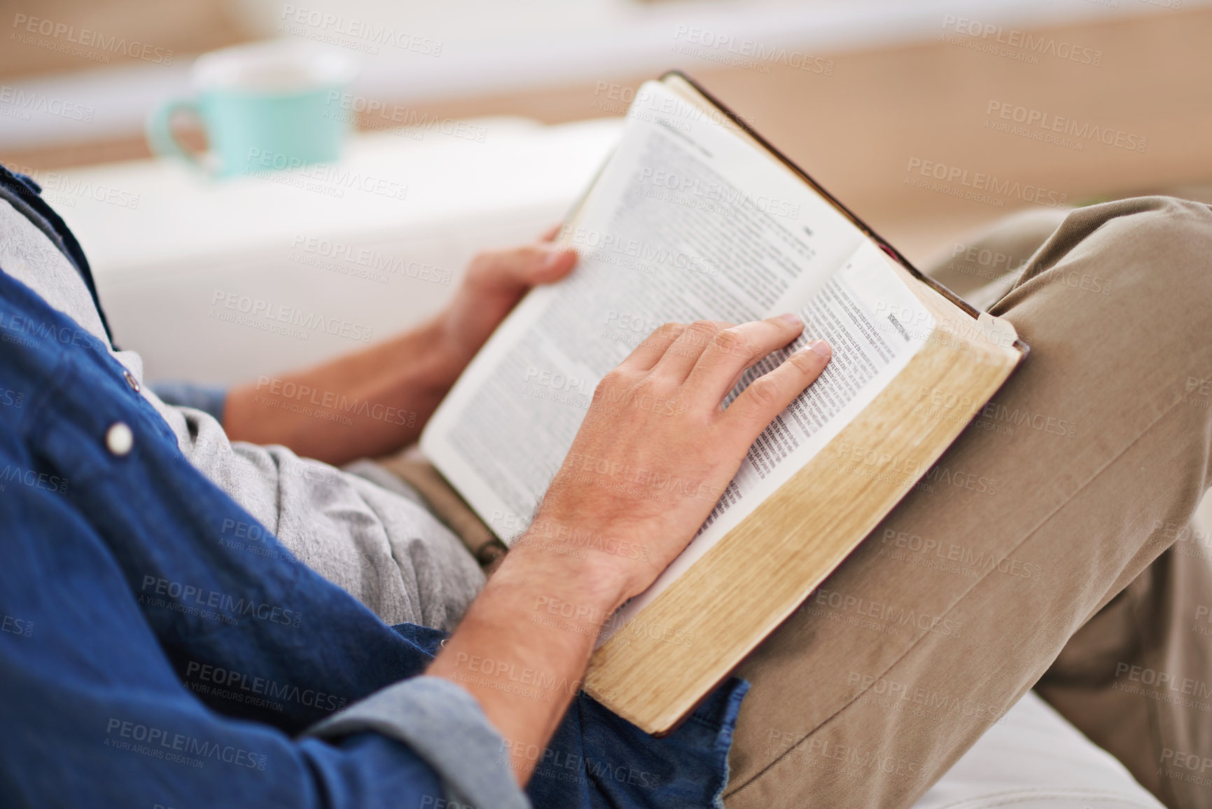 Buy stock photo Person, hands and reading bible or scripture for Christianity religion for information, Jesus or belief. Worship, prayer and learning in home apartment or God education as praise, research or help