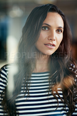 Buy stock photo Cropped shot of a casually-dressed businesswoman standing in her office