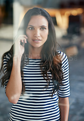 Buy stock photo Cropped shot of a casually-dressed businesswoman standing in her office