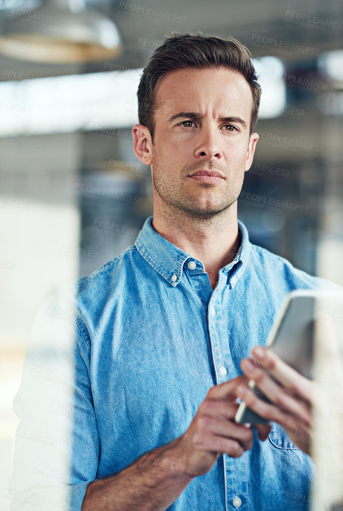 Buy stock photo Serious, businessman and thinking with tablet by window in office for schedule, information or planning. Male person, web design and idea with digital technology for ux update, research or networking