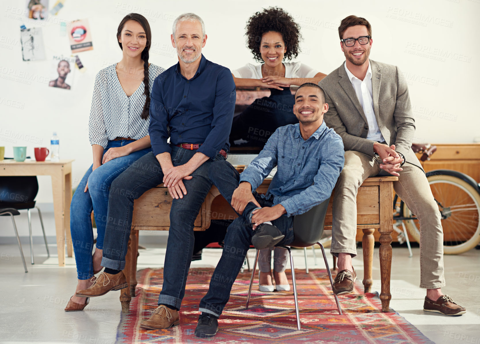 Buy stock photo Shot of a group of creative professionals working in an office