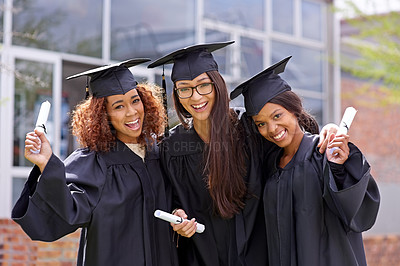 Buy stock photo Celebration, college and portrait of students at graduation excited for future with pride. Smile, happy and confident girl friends cheering for university degree, diploma or certificate on campus.