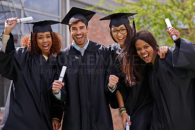 Buy stock photo Shot of excited university students on graduation day