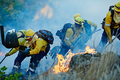 Buy stock photo Danger, forest and firefighter team with emergency, disaster management and damage control in bush. Mountain, flame and people help with fire rescue, volunteer service or smoke in nature conservation