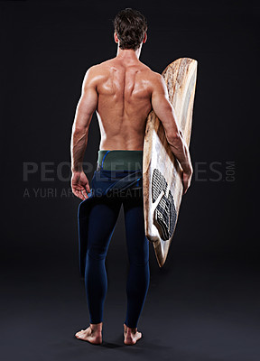 Buy stock photo Studio, surfer and surfboard for sports, fitness and training for competition event. Back of professional athlete, model and man with muscle, activity or hobby on dark background with pride or pose