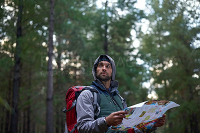 Buy stock photo Search, forest and man with map for direction to camp in woods and thinking of adventure navigation. Confused, travel and lost in nature trekking with backpack and plan to location on hiking journey