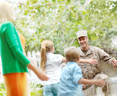 Buy stock photo Excited, family and welcome of army father or emotional celebration, hug and safety of military service return. Man, soldier and children for embrace of reunion together, patriotism and house garden