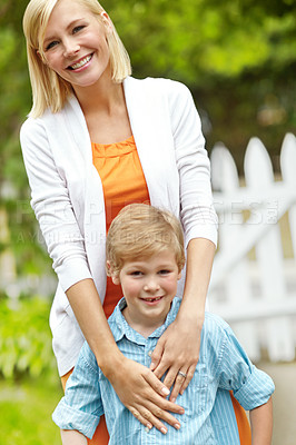 Buy stock photo Hug, portrait or boy in backyard with mother, smile and family in nature together in Australia. Single parent, confidence or proud mom in home with love, care or happy male kid on holiday vacation