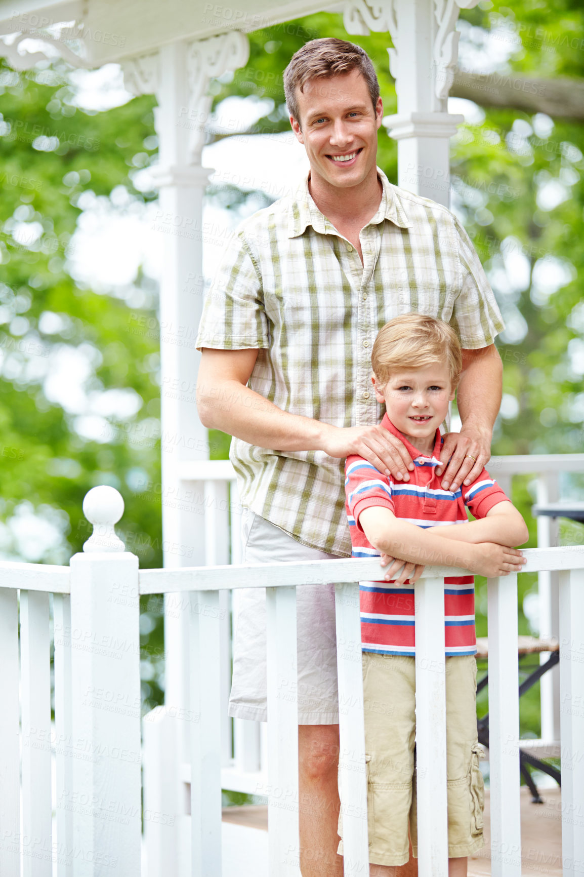 Buy stock photo A young boy and his father sharing some quality time together on the porch
