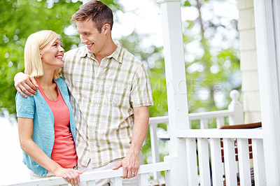 Buy stock photo Hug, love and smile with couple on porch in garden of home for bonding, romance or support. Happy, security or trust with man and woman embracing on backyard veranda for moment or relationship