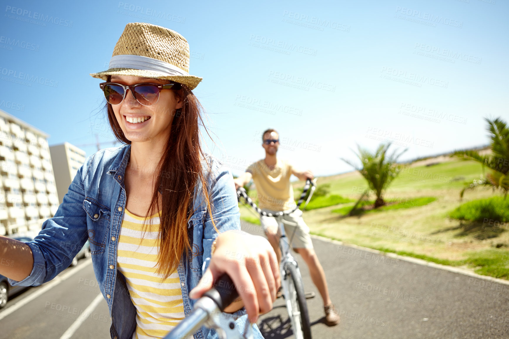 Buy stock photo Love, bicycle travel and couple cycling, happy and enjoy outdoor time together, bond and fun romantic date. Mockup, freedom and bike transport journey for man and woman on summer holiday in Portugal