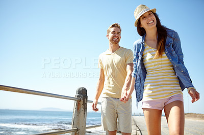 Buy stock photo Love, beach and portrait of couple holding hands at the beach for travel, fun and summer vacation. Sea, holiday and young man with woman bond while walking, happy and smile while relaxing in Florida