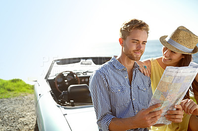Buy stock photo Road trip, adventure and couple with map by car on summer holiday, vacation and weekend getaway by ocean. Travelling, freedom and man and woman reading paper for directions, navigation and journey