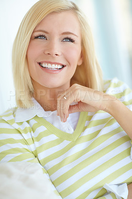 Buy stock photo Shot of a beautiful blonde woman relaxing at home