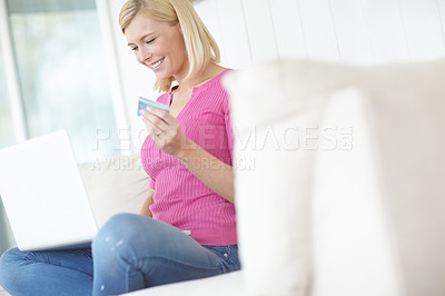 Buy stock photo Shot of a beautiful blonde woman relaxing at home