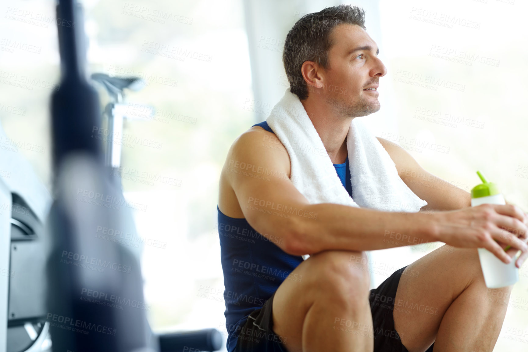 Buy stock photo Fitness, thinking and man with water in gym for body wellness, health ideas and nutrition for hydration. Workout, sports and person with drink bottle on break for relax, resting and planning training