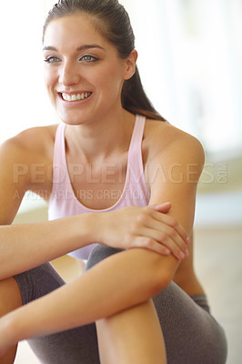 Buy stock photo A happy young woman sitting in an exercise class and smiling