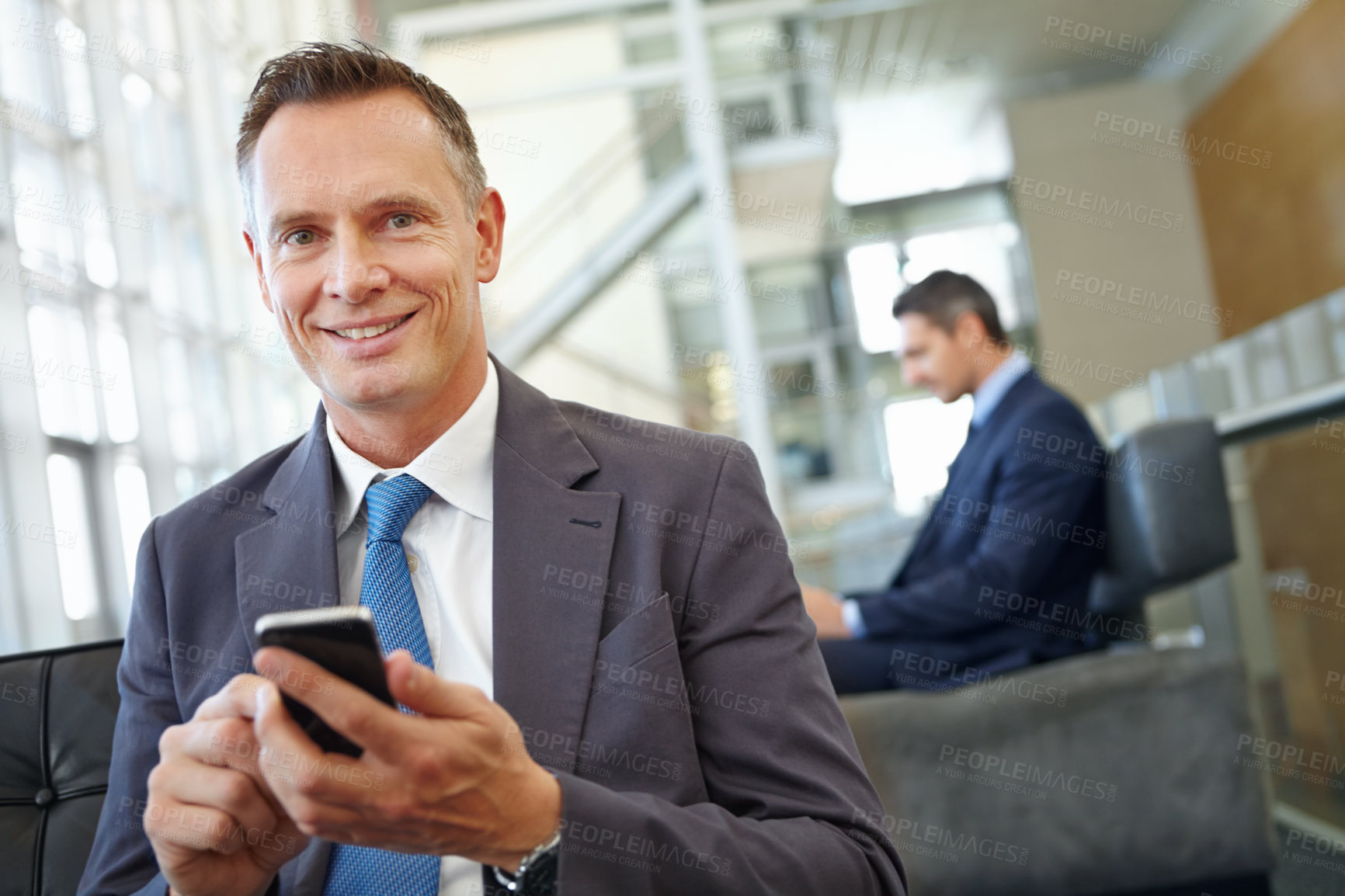 Buy stock photo Portrait, happy or business man with phone in office for motivation, company research or website review. Manager or CEO with smartphone in hotel lobby for social network, internet or mobile app