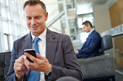 Buy stock photo Happy, corporate or business man with phone in office for social media, content research or website review. Manager, accountant or employee with tech for social network, internet or mobile app 