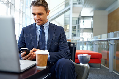 Buy stock photo Businessman with smartphone, focus and company communication or social media with coffee while working. Contact, online and email with networking, b2b and worker in professional corporate lounge