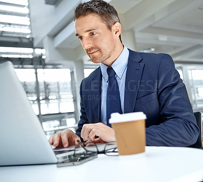 Buy stock photo Laptop, office and businessman working on a report or corporate proposal for the company. Success, technology and professional male employee from Canada doing research for a project in the workplace.