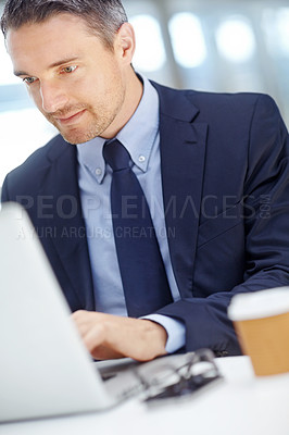 Buy stock photo Office, typing and man accountant working on a statistics report on a laptop for a finance company. Success, technology and vertical shot of a businessman planning financial proposal in the workplace