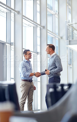 Buy stock photo Business people, handshake or greeting in hotel lobby, modern office or airport lounge in CRM meeting. Smile, happy or mature workers shaking hands in partnership deal, collaboration or b2b agreement