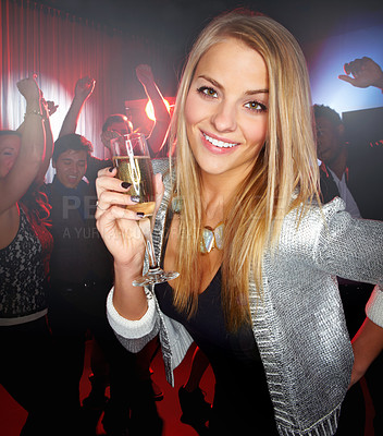 Buy stock photo Night club, party and woman with champagne to celebrate, techno smile and social at a rave event. Rock disco, happy concert and portrait of a girl at a club new year celebration with a drink