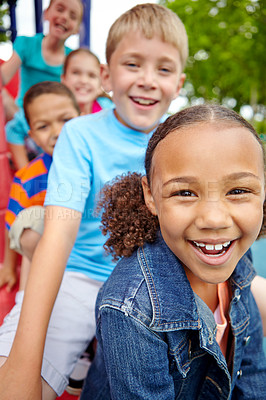 Buy stock photo Children, park and outdoor slide for friends, playground group and portrait for diversity. Kids, happiness and outside games for development at school academy, students break and bonding together