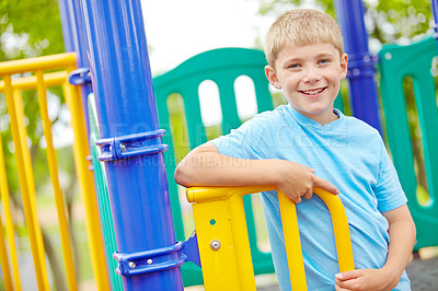 Buy stock photo A multi-ethnic group of happy children playing on a jungle gym in a play park