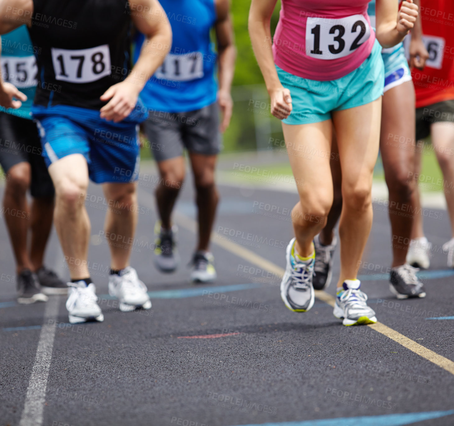 Buy stock photo Cropped shot of athletes' legs during a race
