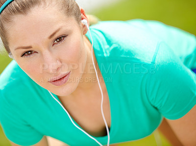 Buy stock photo Earphones, breathing and woman in nature for running with race, marathon or competition training. Sports, audio tech and female athlete listening to podcast, music or radio for cardio workout in park