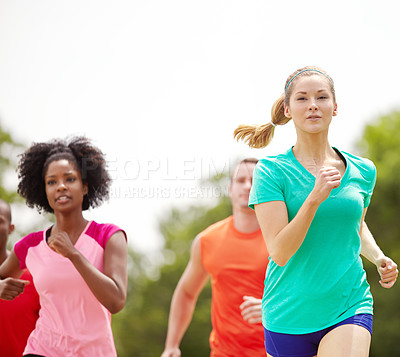 Buy stock photo People, fitness or running with friends in nature for outdoor workout, exercise or physical activity together. Athlete, runners or group with sprint for race, cardio training or health and wellness