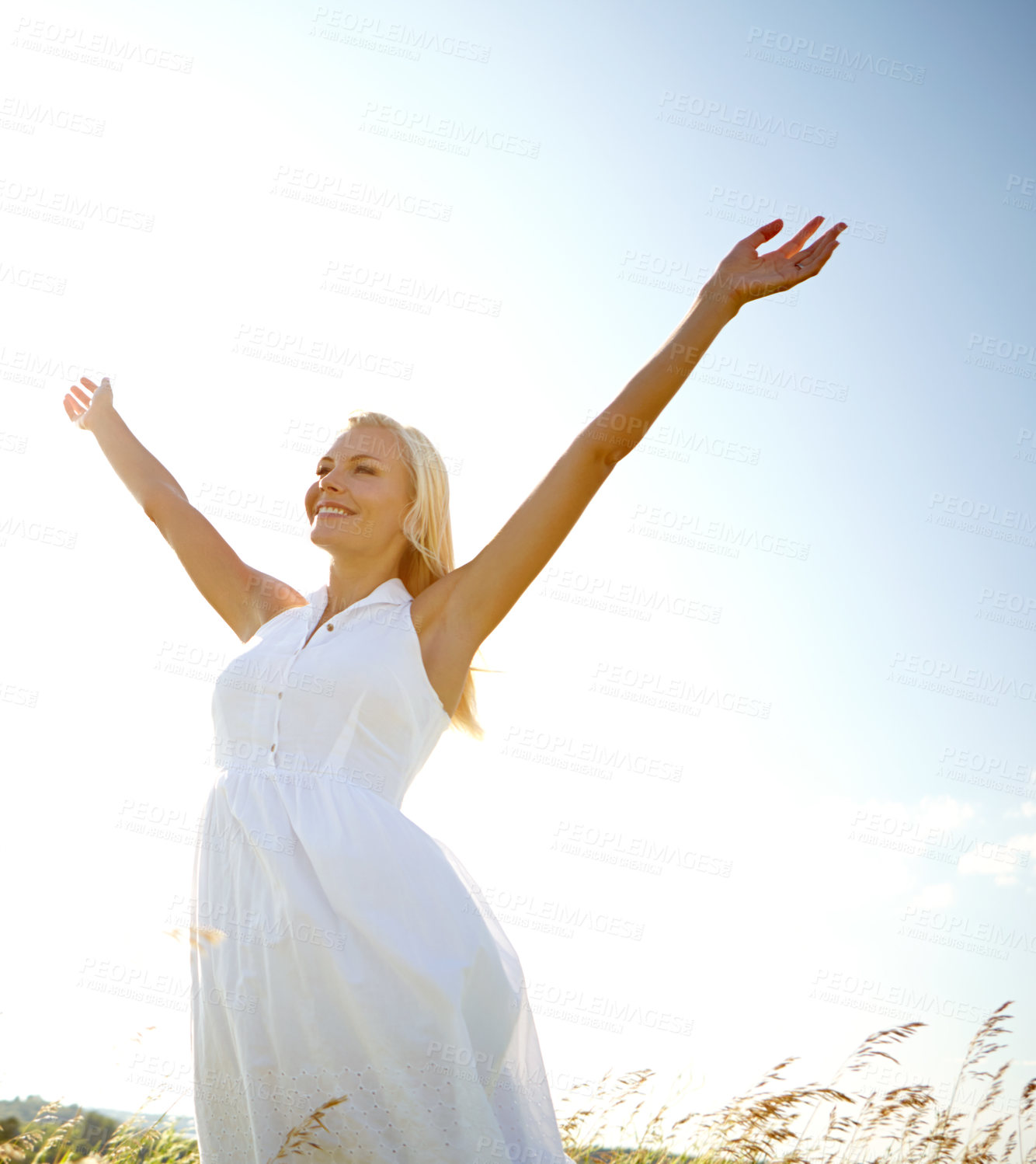 Buy stock photo Freedom, field and woman with open arms on holiday for travel, vacation and calm on journey. Nature, peace and person with hands outstretched on sky for fresh air, adventure and smile in countryside