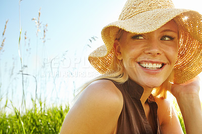 Buy stock photo Nature, travel and woman with sunhat on vacation in countryside for adventure or getaway. Happy, journey and female person outdoor with accessory on holiday, journey or weekend trip in summer.