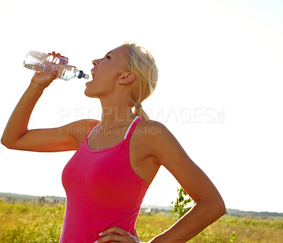 Buy stock photo Woman, fitness or drinking water with hydration in nature for break, rest or refreshment in countryside. Thirsty, female person or runner with mineral liquid for natural sustainability or recovery