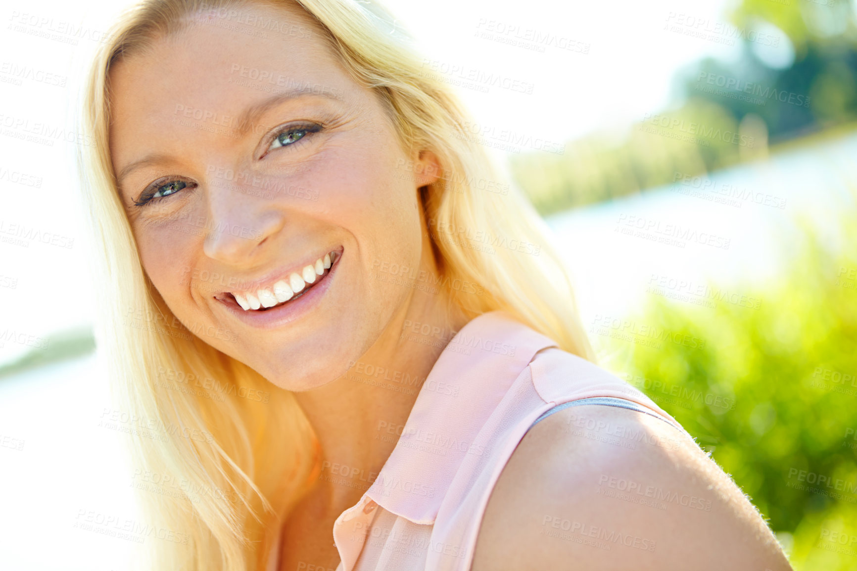 Buy stock photo Portrait of a beautiful blonde outside with copyspace