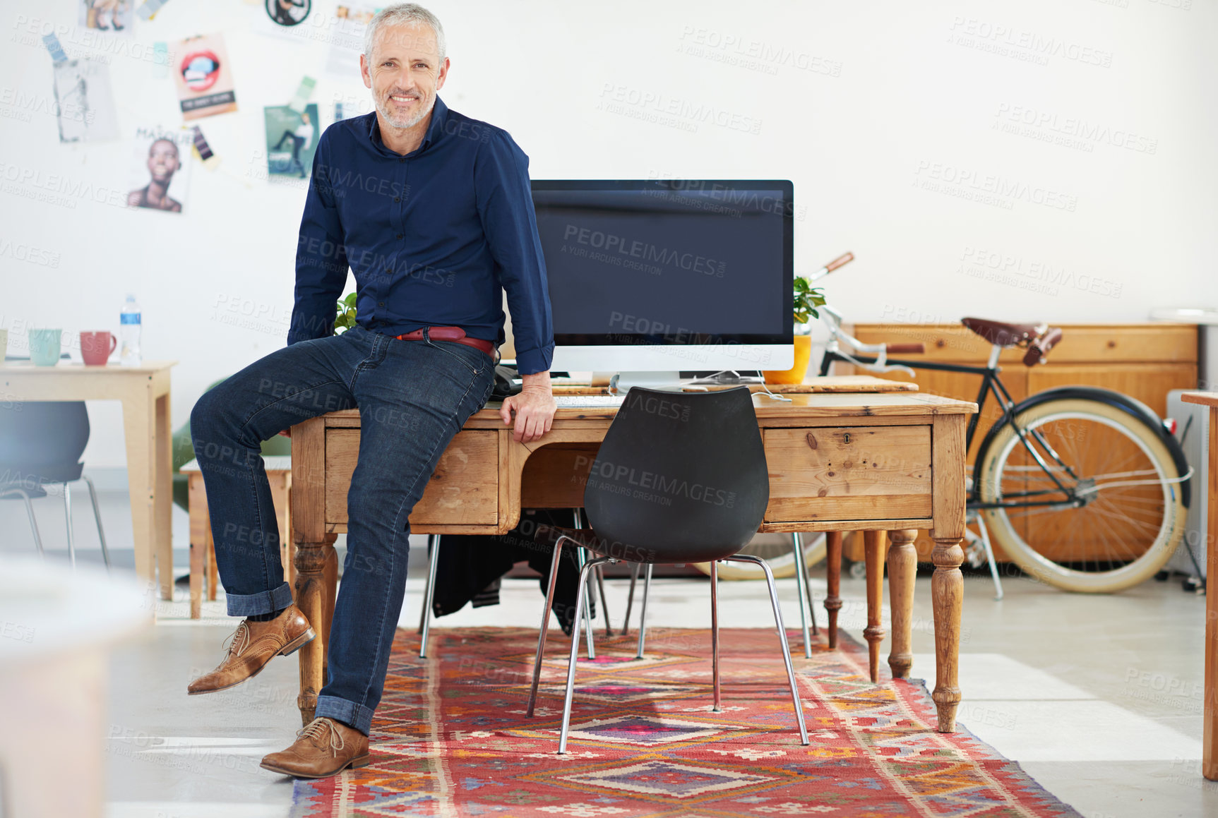 Buy stock photo Portrait of a handsome mature male designer in his modern office