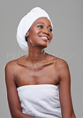 Buy stock photo Black woman, skincare and cosmetics with dermatology, pamper and makeup on white studio background. Glow, African person and model with healthy skin or spa treatment with wellness, smile or aesthetic