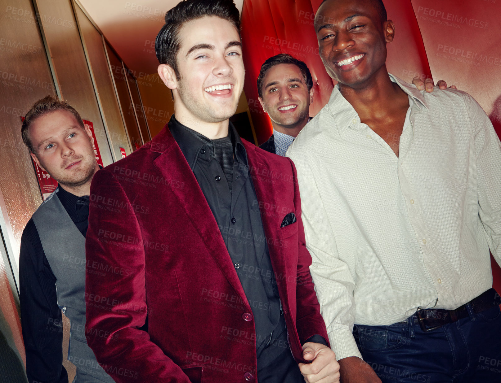 Buy stock photo A group of smartly dressed men arriving at a nightclub together