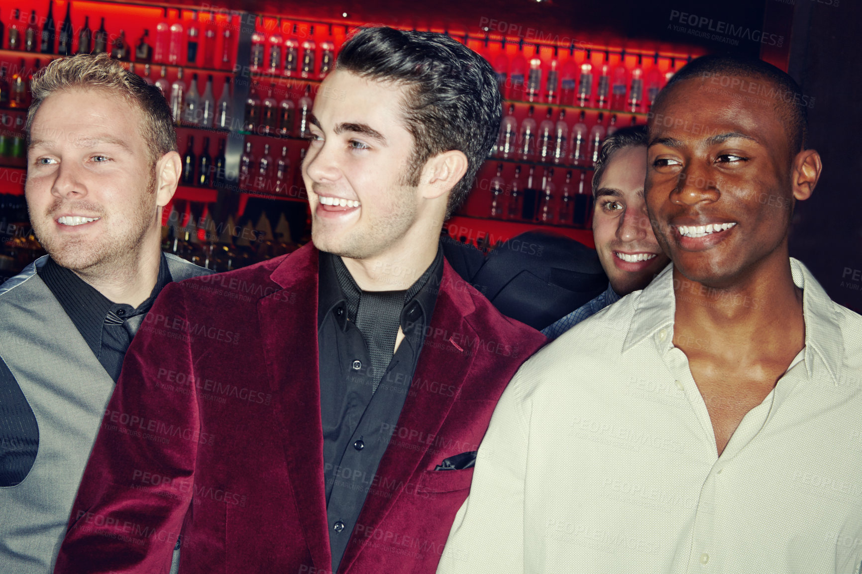 Buy stock photo A group of smartly dressed men arriving at a nightclub together